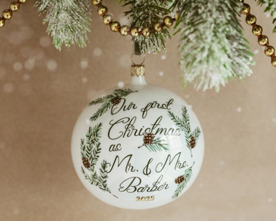 Our first Christmas ornament as married in pinebranch design